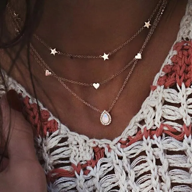Collier multi-chanes pendentifs en lune, étoile, cur et perle - couleur Or