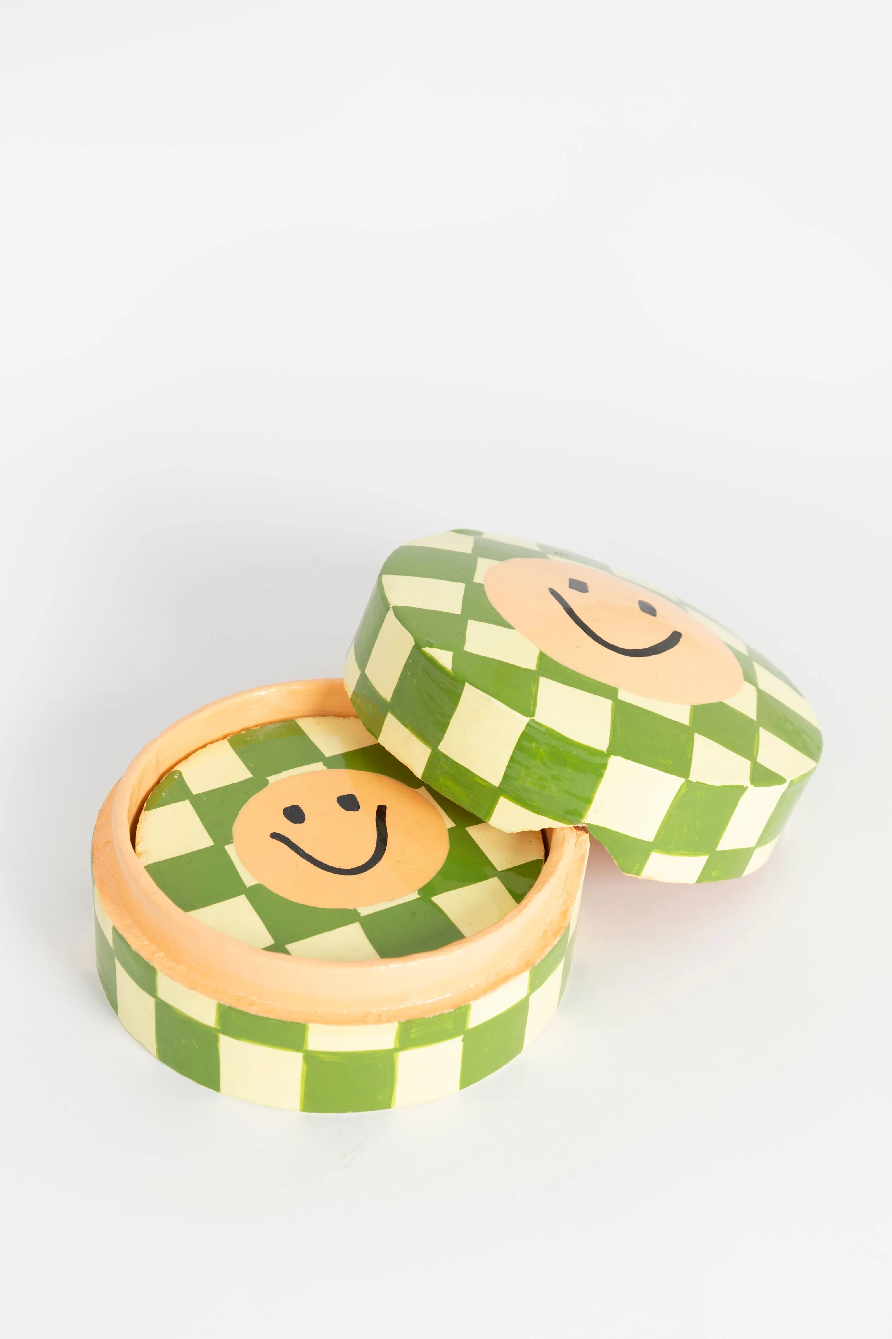 Dessous de verre à carreaux avec smiley - vert