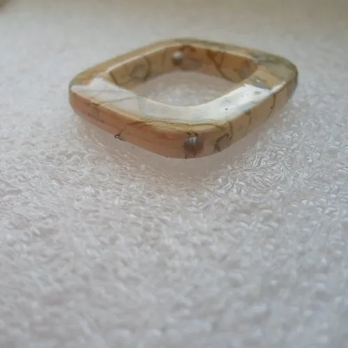 Speckled Acrylic Diamond-Shaped Bead.